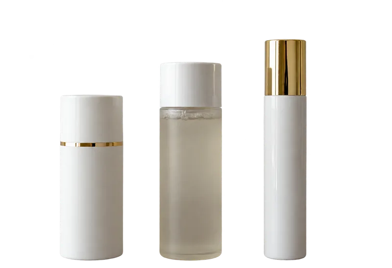 Three unbranded white skincare bottles