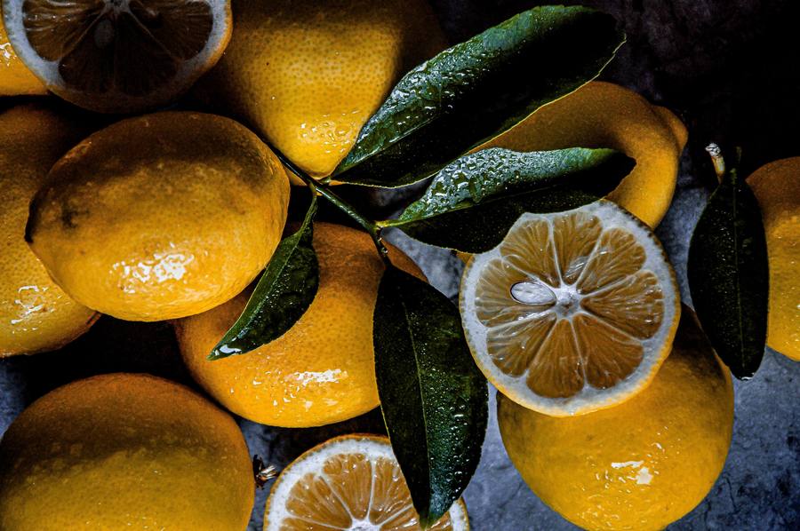 Cut lemons with leaves.