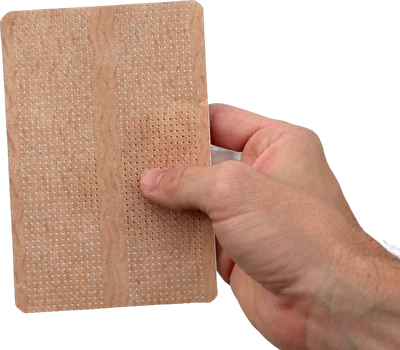 A Miracle Bandage held in a hand