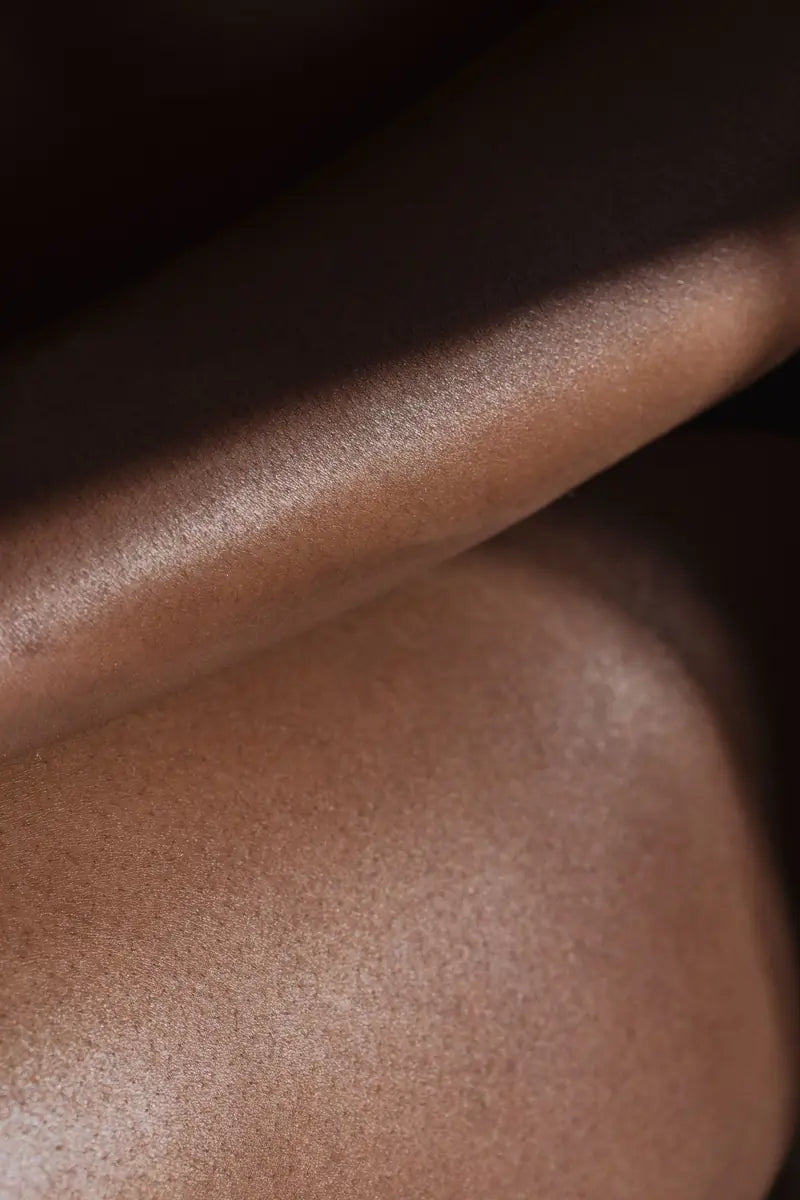Close-up of smooth skin on folded arms
